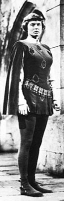 full view of Joan in her tunic and hose